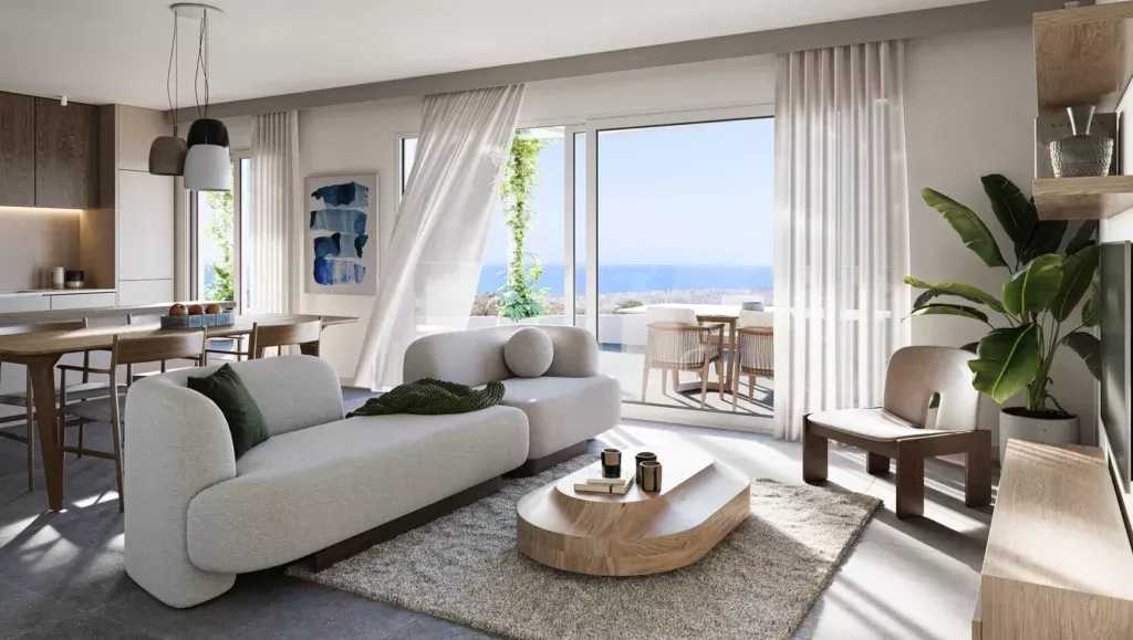Living room with a sofa and sea views in a five2one home