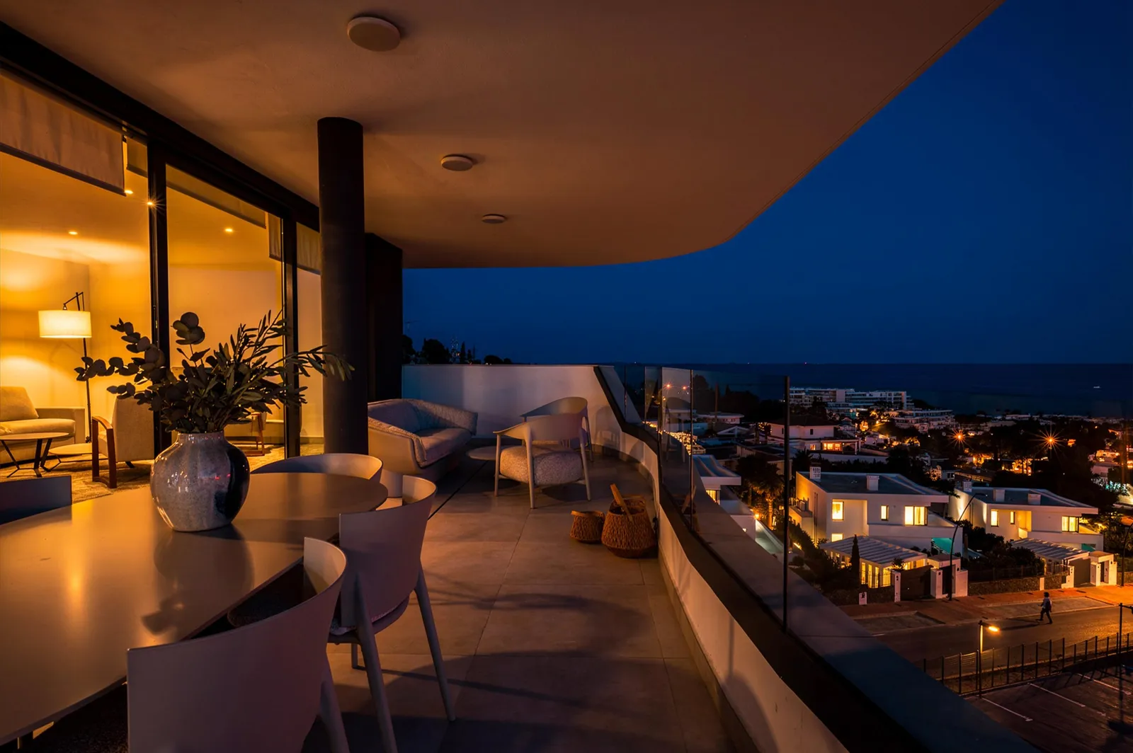Terrace at night with lighting and city views at HW3