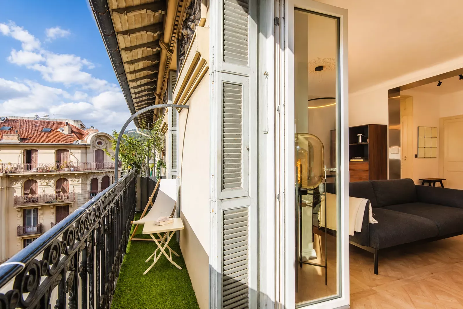 Balcony beside the living room of the Nice apartment overlooking a building