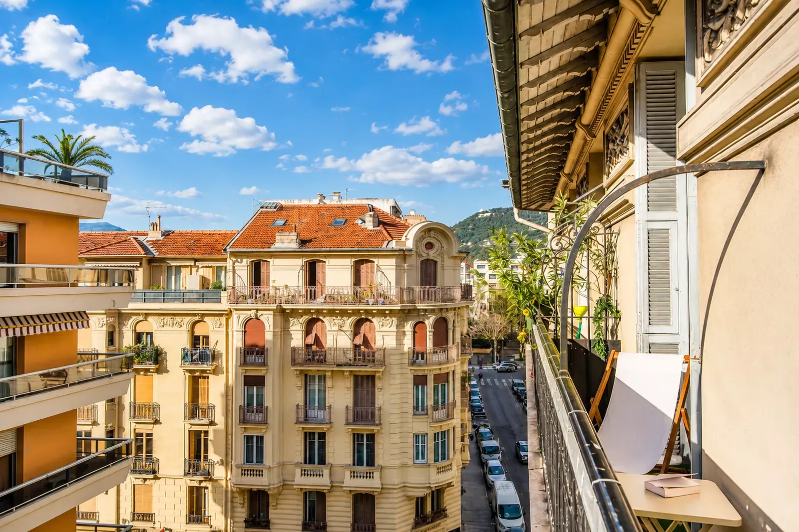 Balcony view over the elegant façades of a street in central Nice